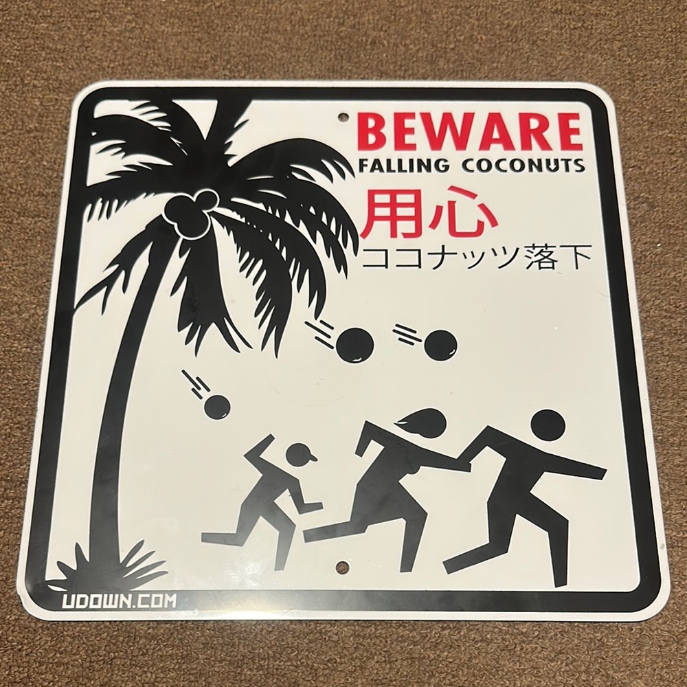 Police Navidad / beware Falling. coconuts two sided Sign